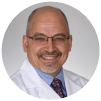 Dr. John Comisi Dr. John Comisi